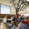 New Faculty Orientation participants in Shusterman Hall