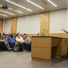 Faculty member speaking in lecture hall