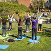 Yoga Class outside on Campus for Wellness Day at Temple