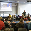 Dr. José Antonio Bowen speaking to crowd at annual faculty conference